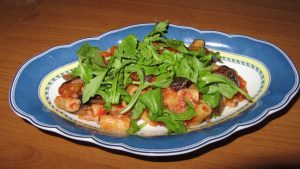 Pasta melanzane, rucola e scamorza