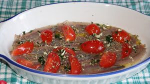 alici con pomodori